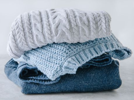 Bild vergrößern Pullover-Stapel